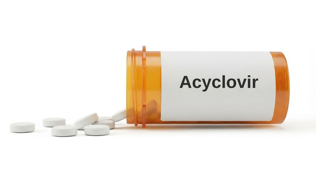 An amber prescription bottle lying on its side on a white background with a plain white label reading Acyclovir, and six small round white tablets spilled out in front of it.