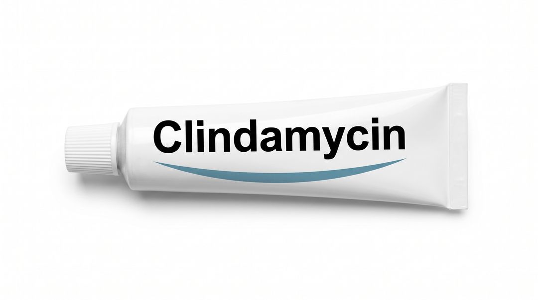 A white metal tube lying at an angle on a white background, white ribbed cap to the left, labeled Clindamycin in black lettering with a teal swoosh curving beneath the word.