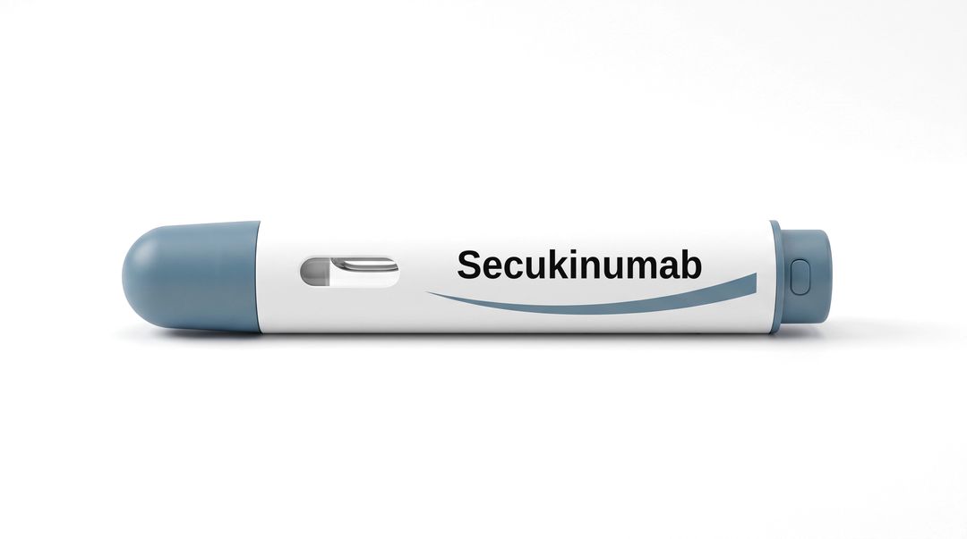 A white injector pen on a white background, with a plain white label reading Secukinumab and a blue swoosh beneath it.