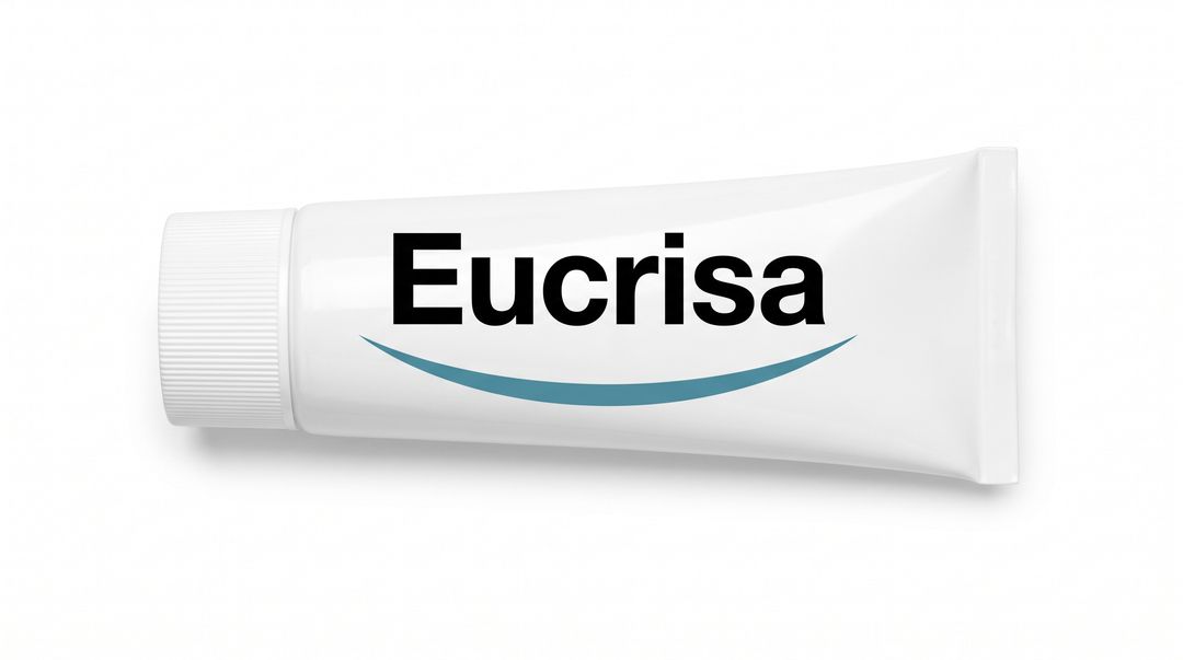 A white tube labeled Eucrisa with a teal swoosh, lying on a plain background