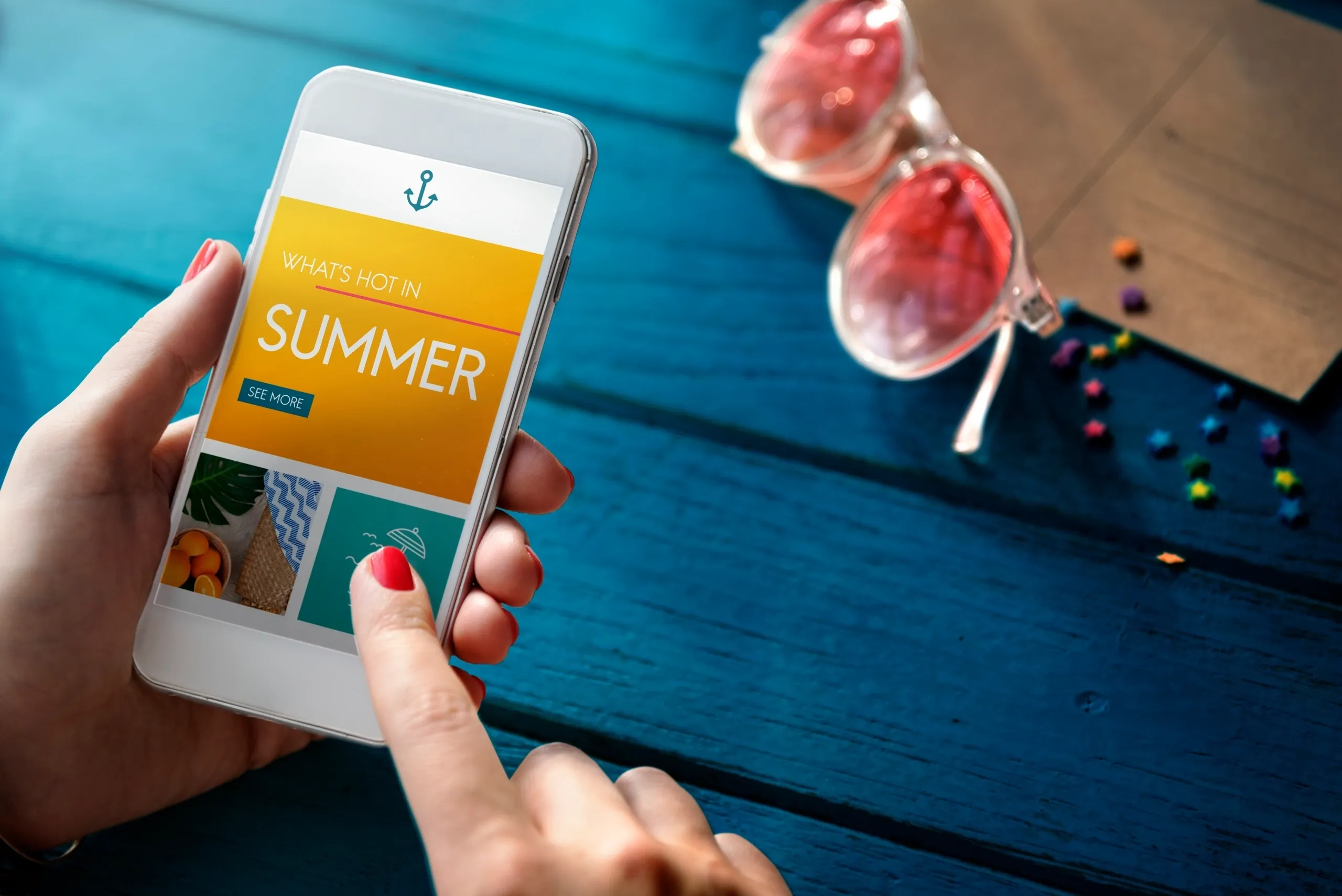 Person managing holiday rental listings and pricing on a smartphone