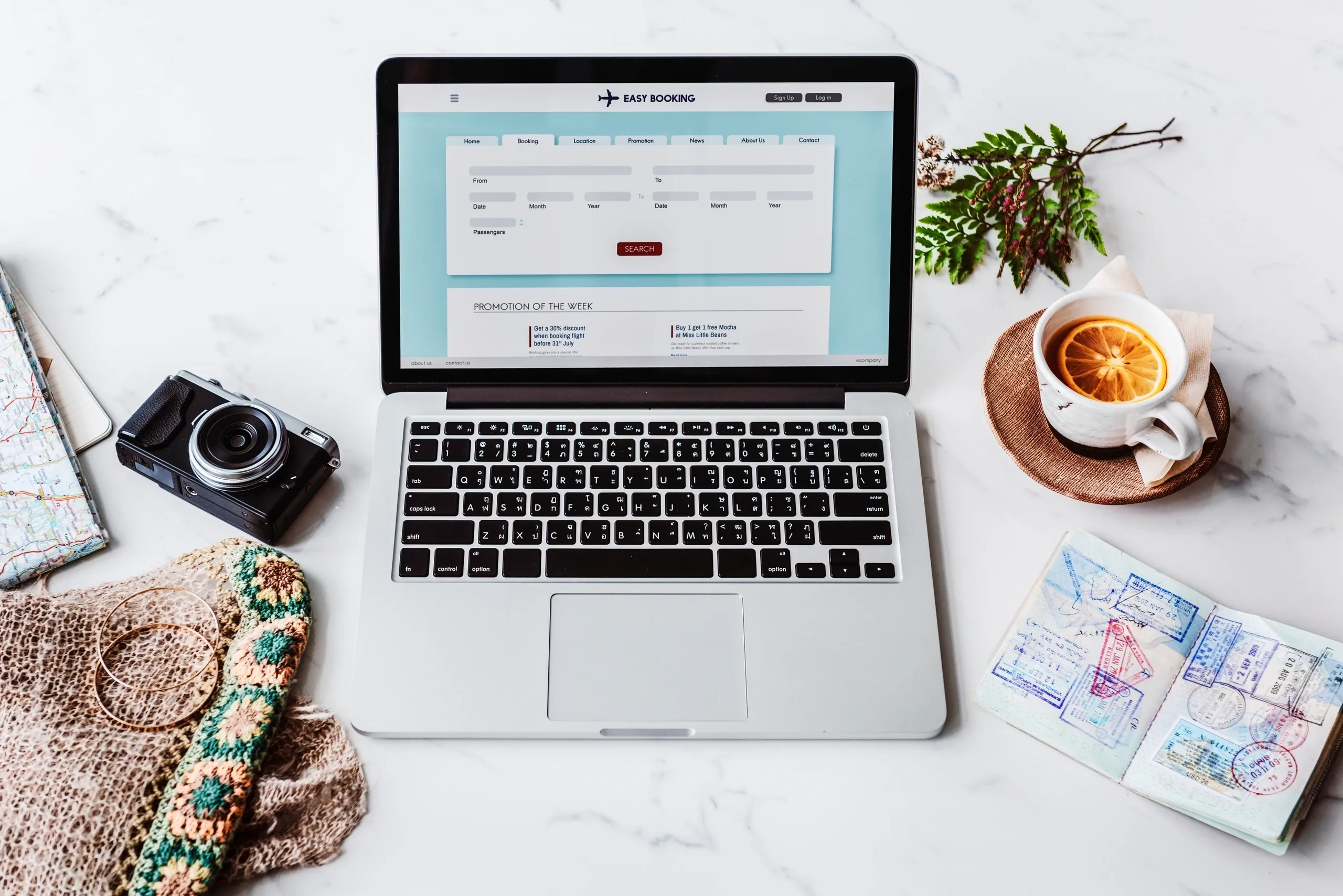 Laptop displaying a holiday rental website for property management and bookings