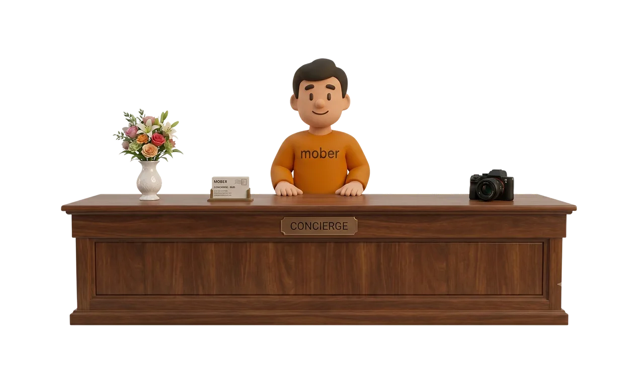 Bud, the Mober mascot, at a concierge desk