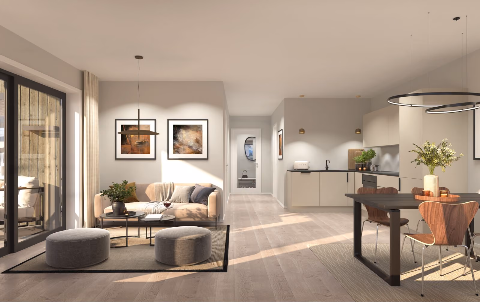 Modern open living room and kitchen with beige sofa, wooden dining table, and large glass doors.