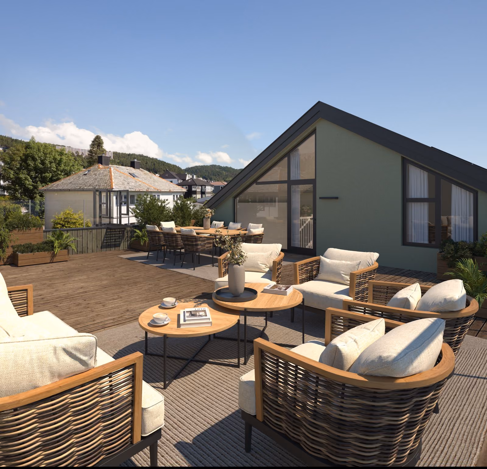 Modern rooftop patio with wicker chairs, cushions, wooden tables, and a dining area under clear sky.