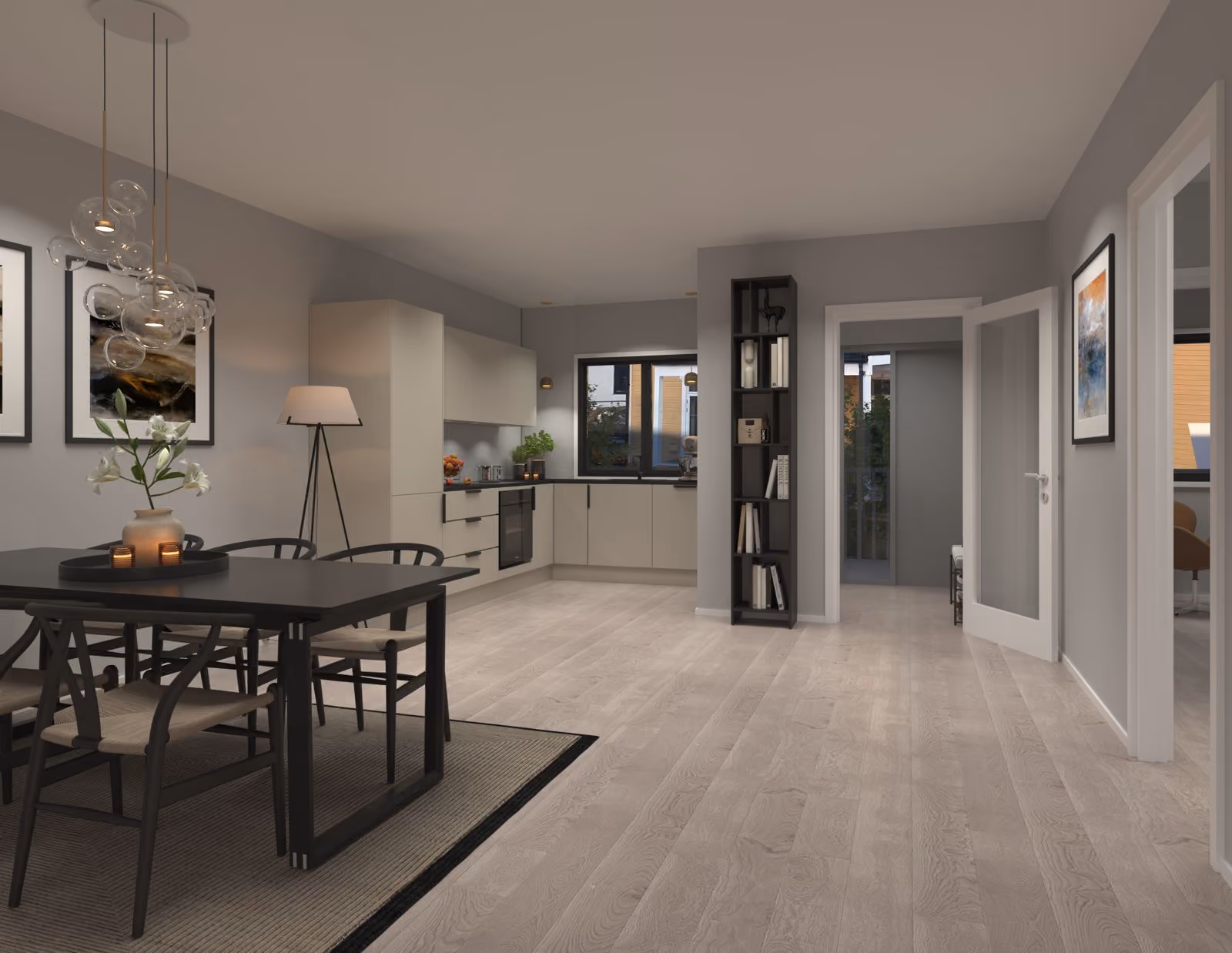 Modern kitchen and dining area with black table, chairs, wooden floor, and light gray cabinets.