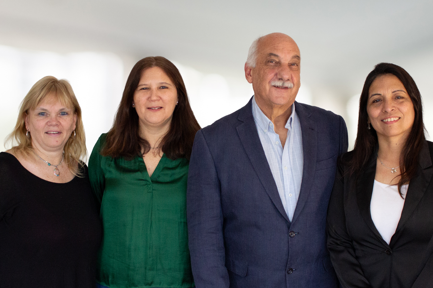 A business team: three woman and a man