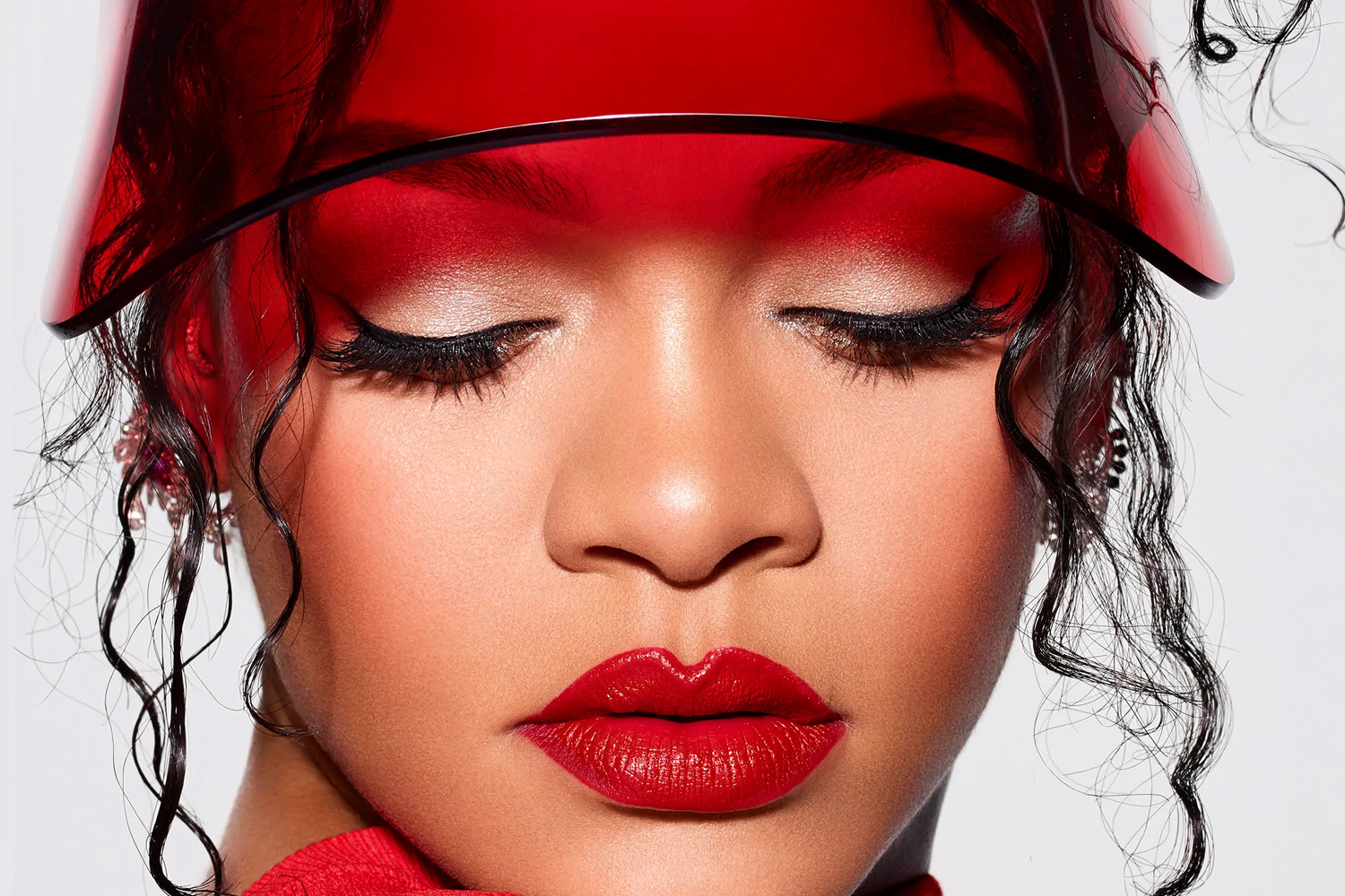 Rihanna posing for Fenty Beauty