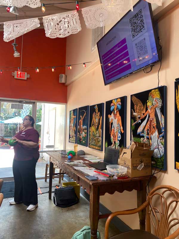 Physical Therapist giving a talk in a public place