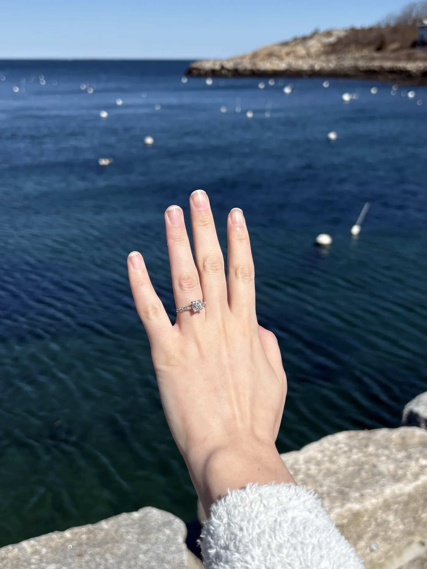 Engagement ring at Rockport harbor