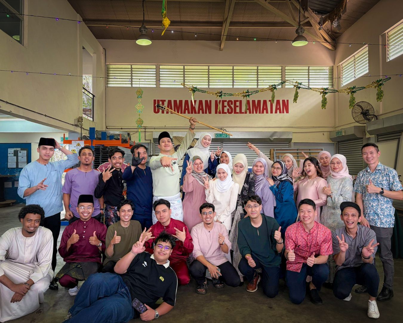 The i2 Energy team and guests at the Hari Raya open house