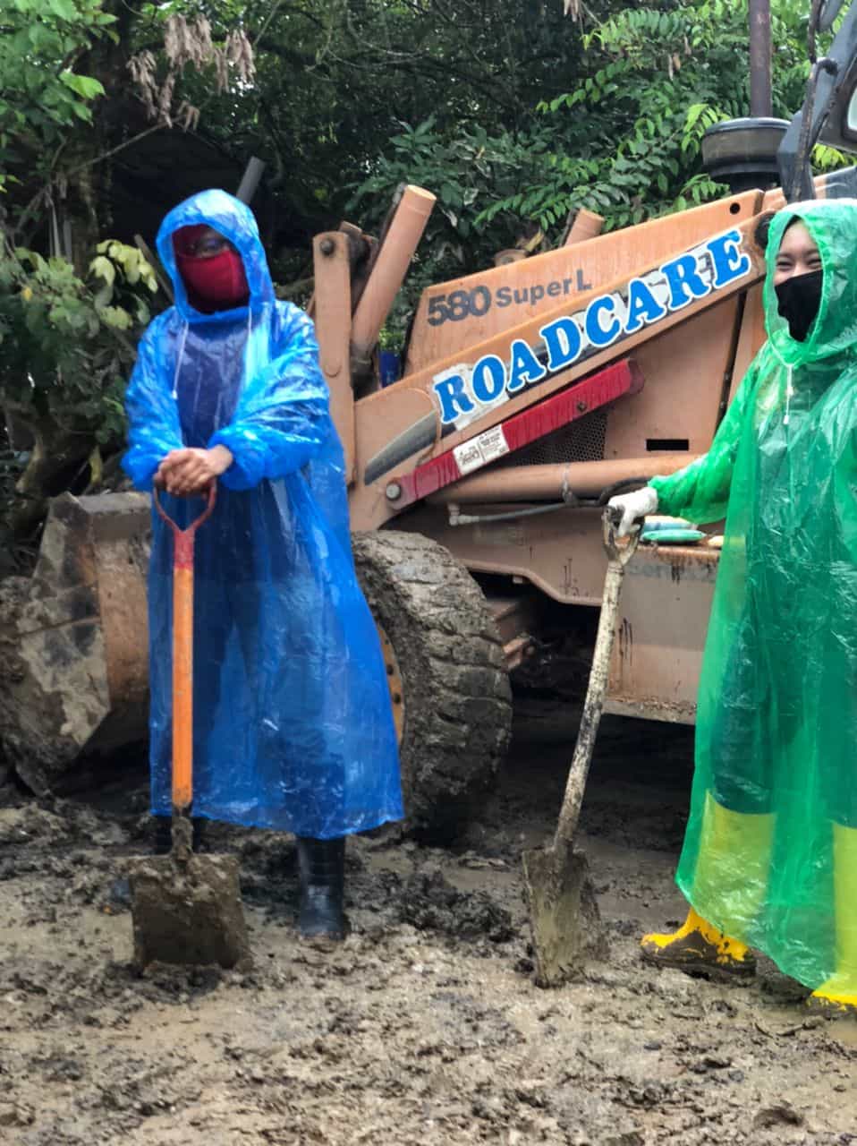 Roadcare plant and crew clearing flood debris in Taman Seri Nanding, Hulu Langat