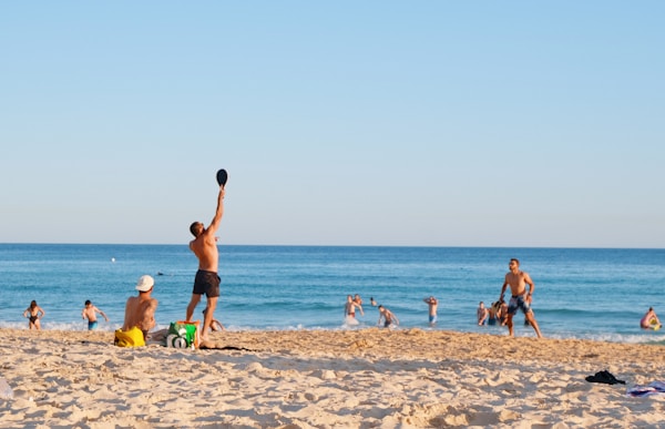 People enjoying a sunny beach