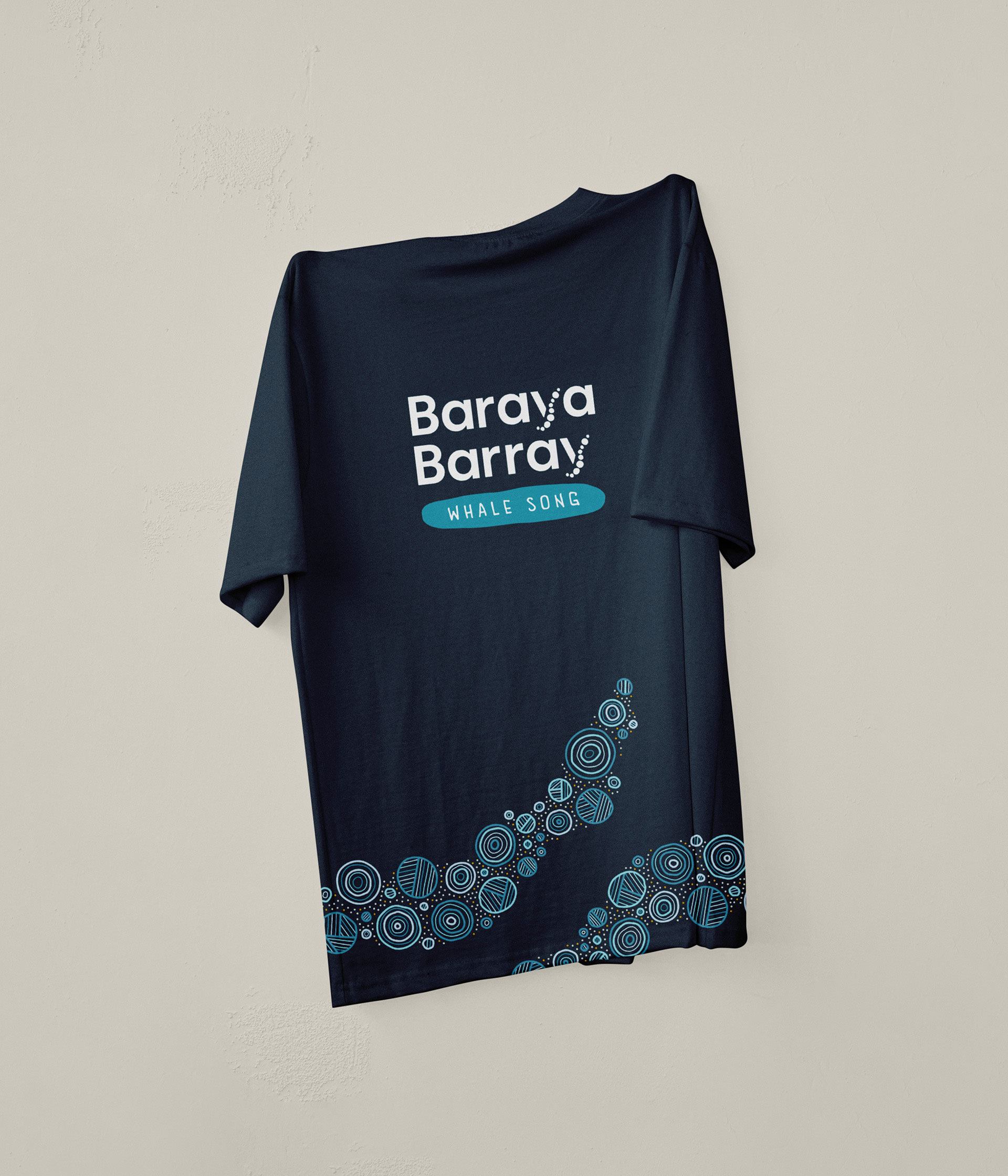 The Baraya Barray logo and pattern work printed on a navy t-shirt