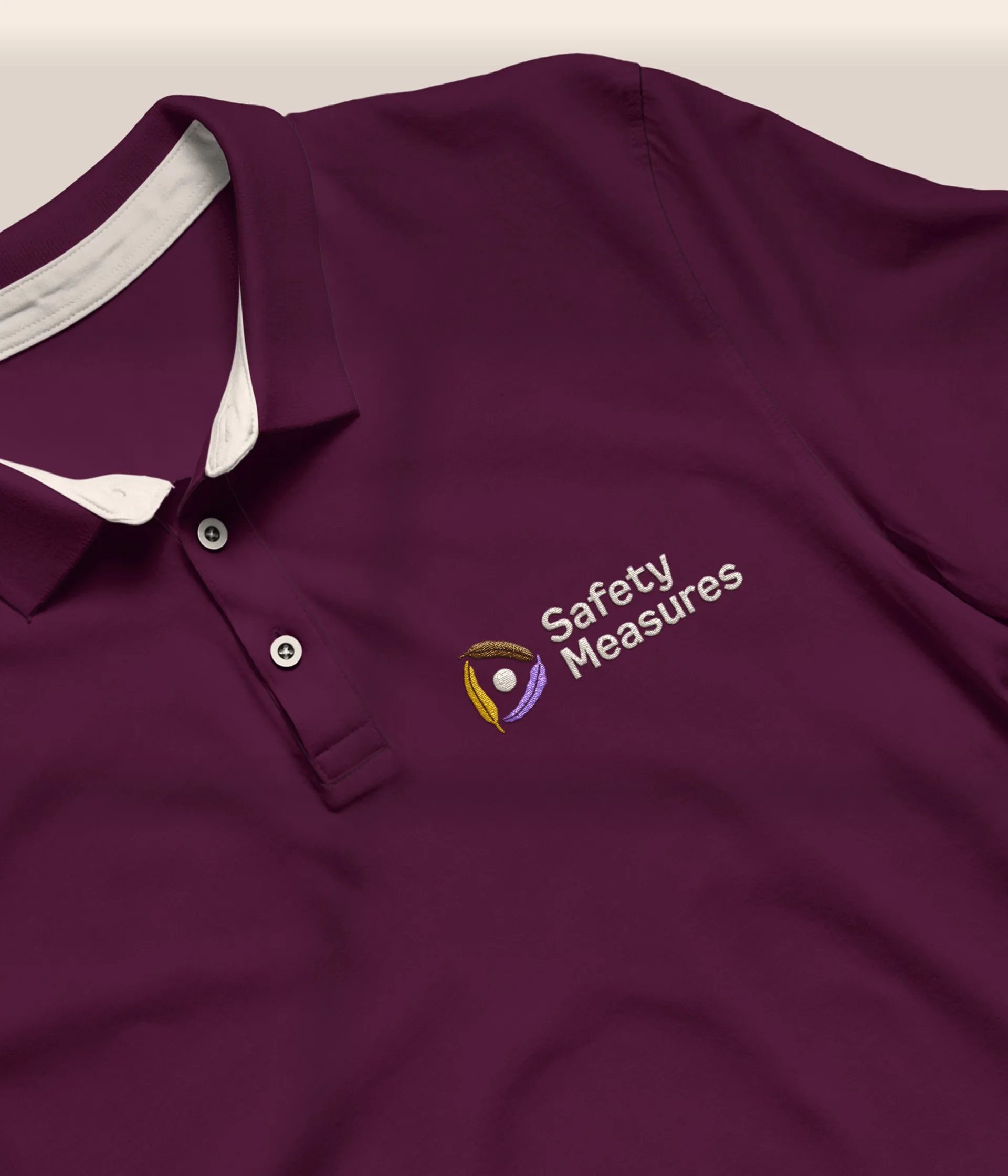 The Safety Measures brand applied to a polo shirt