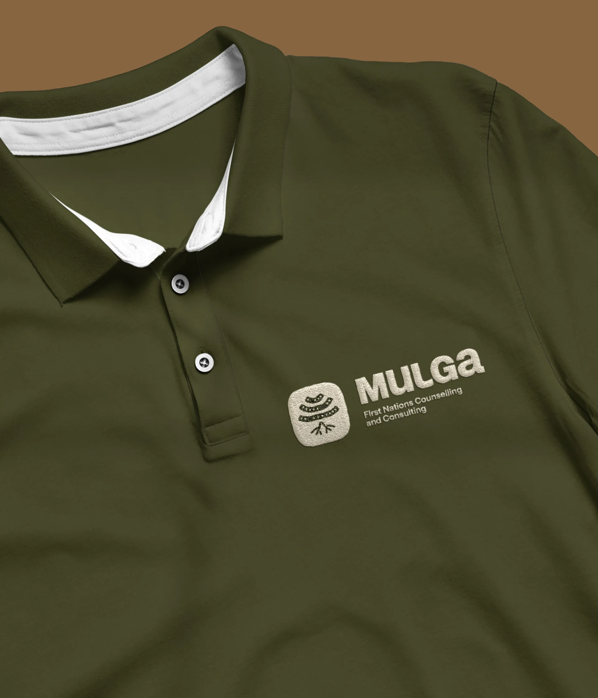 The Mulga First Nations brand applied to a polo shirt