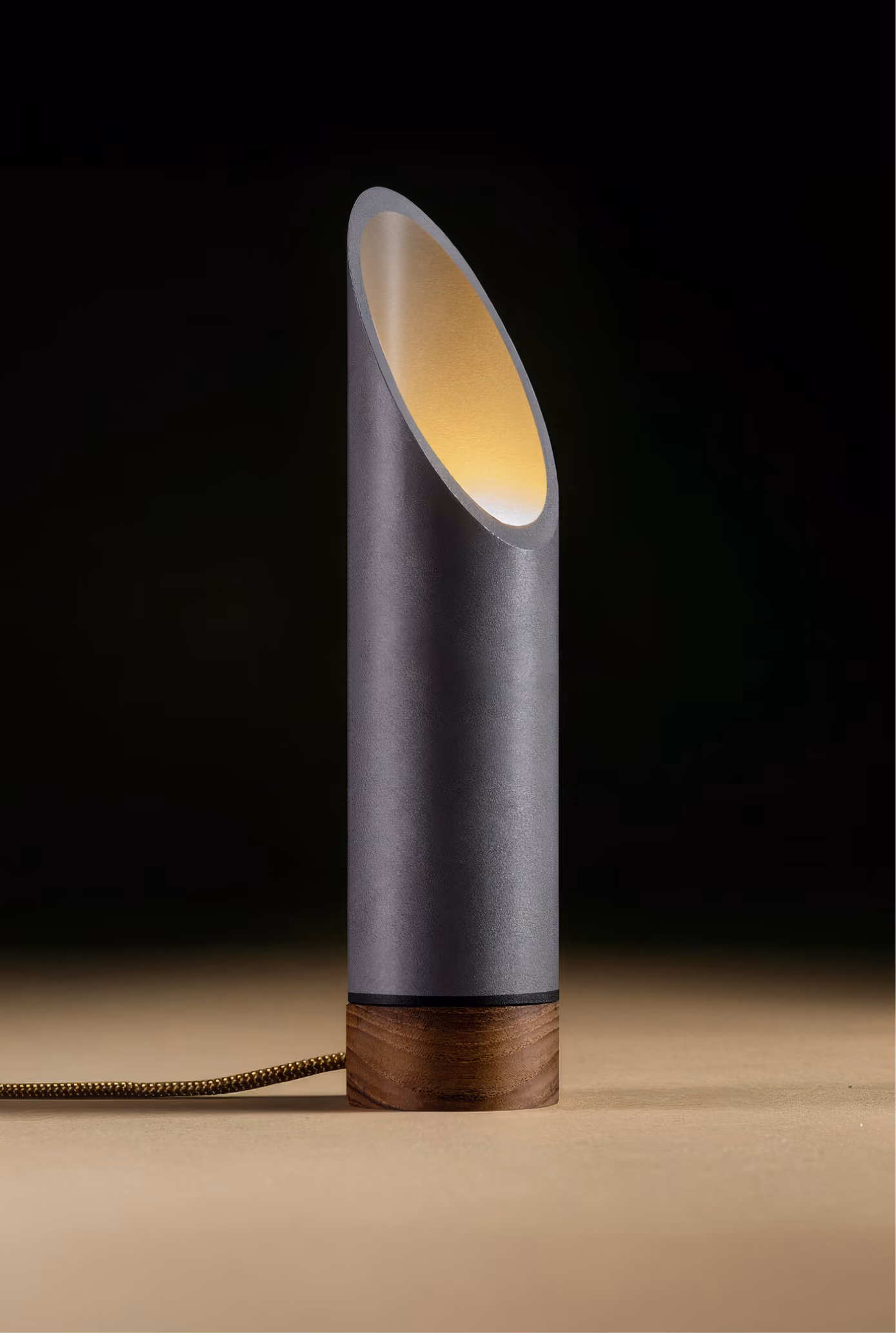 Crafted from salvaged skateboard half-pipe sections with warm copper accents.