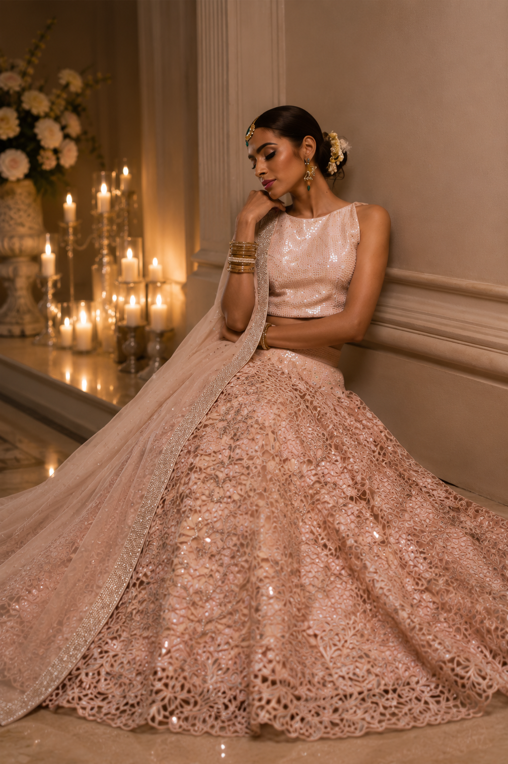 Seated view of blush embroidered bridal lehenga from Moonlit Blush by Alia Qureshi Atelier