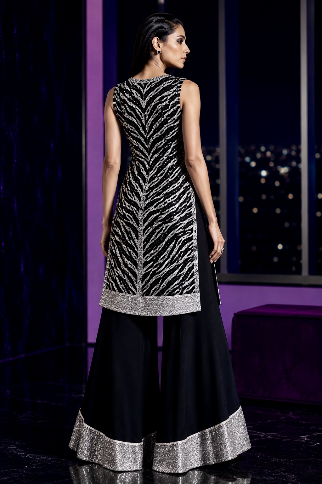 Back view
Back view of black couture ensemble with sweeping silver embroidery from Untamed Noir by Alia Qureshi Atelier