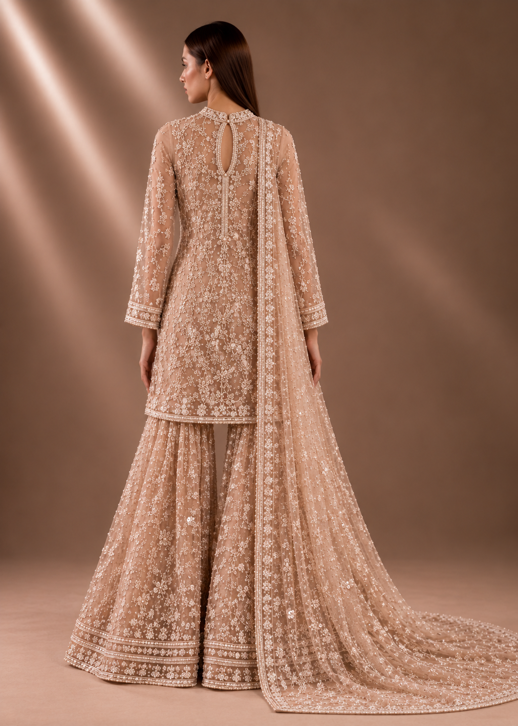 Back view of sheer embroidered couture ensemble with flowing dupatta from Élan de Perle by Alia Qureshi Atelier