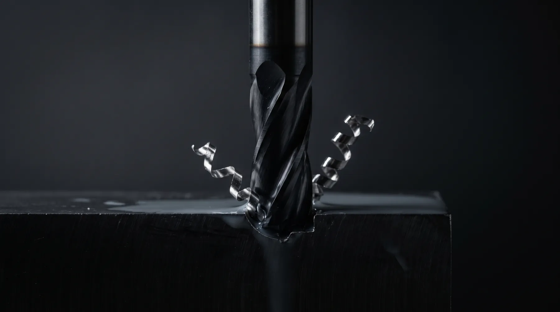 CNC end mill cutting a metal workpiece