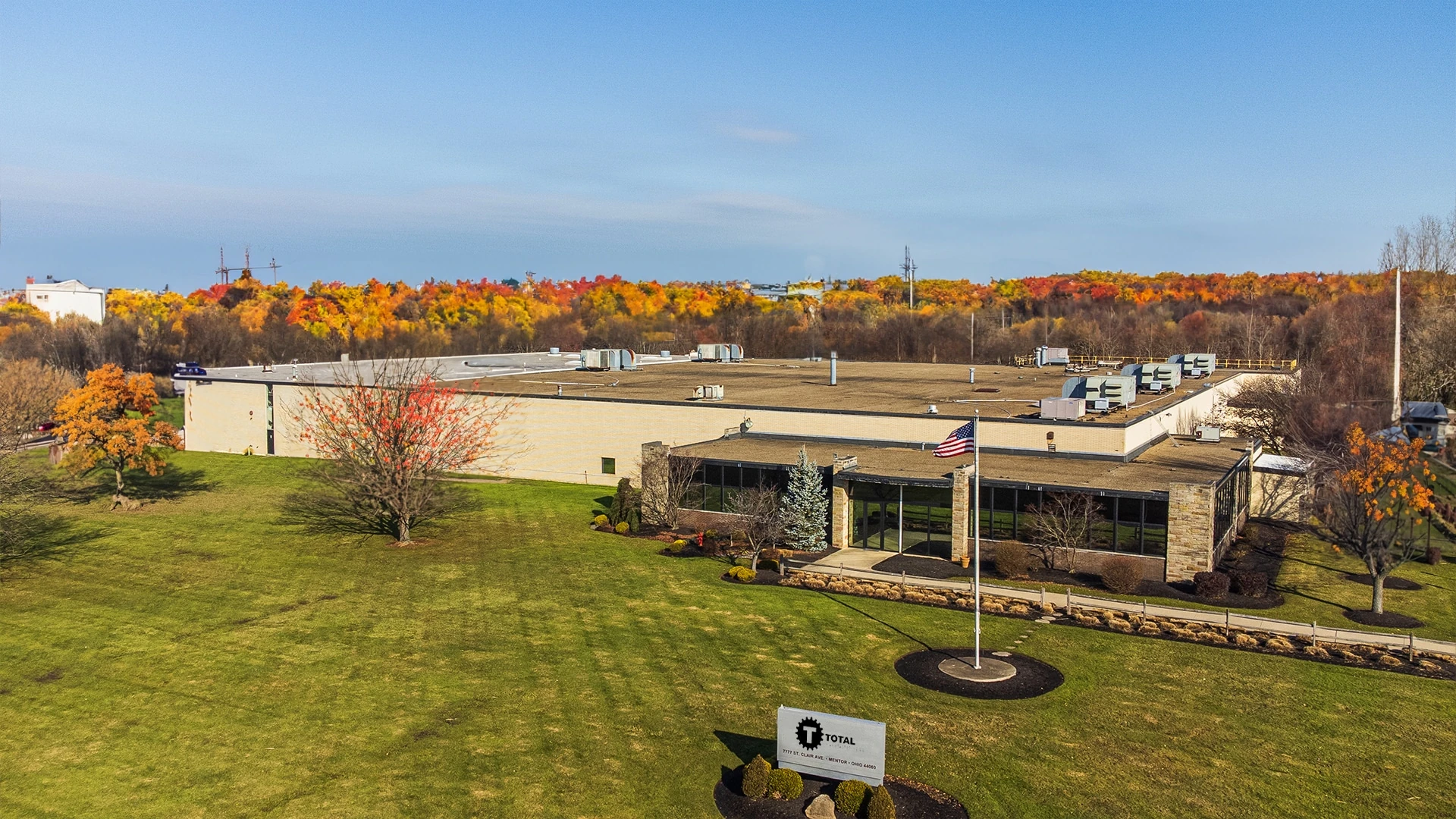The Total Manufacturing building and front entrance in Mentor, Ohio