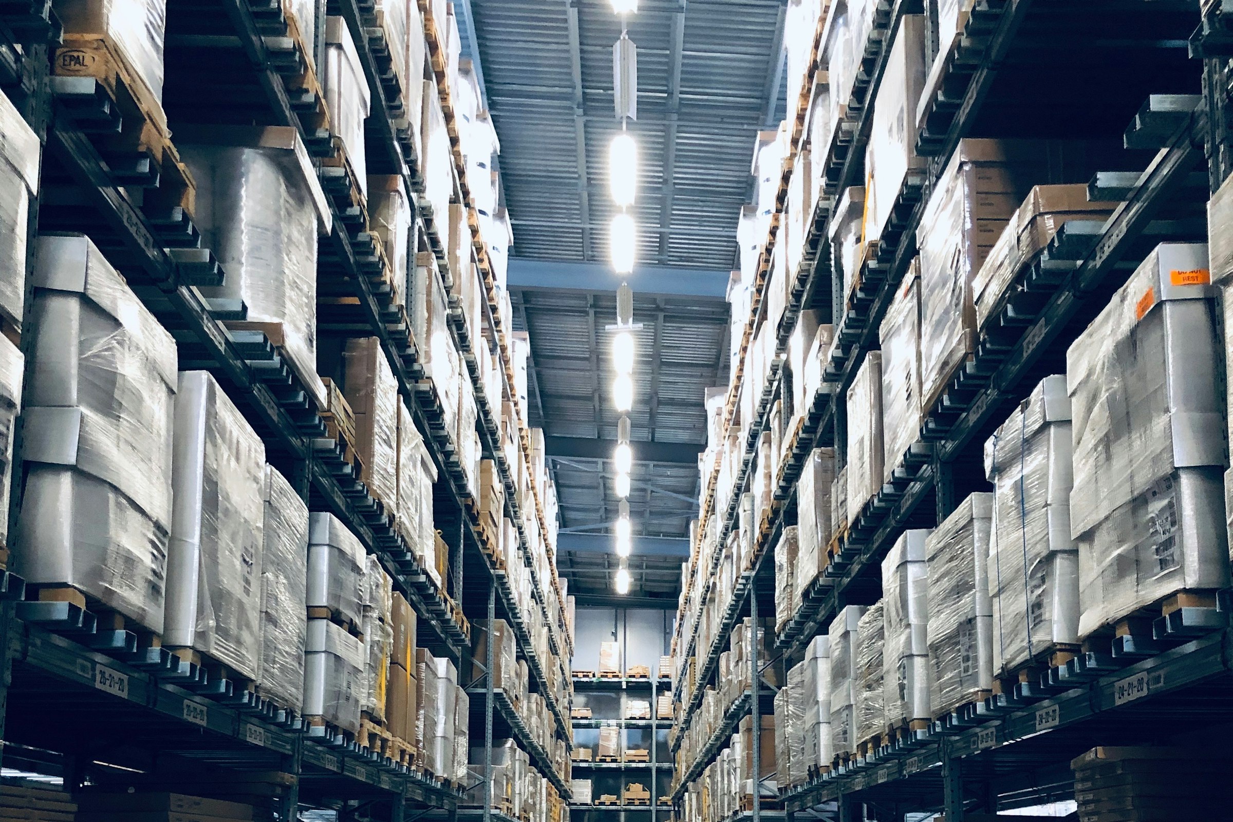 Packages moving through a logistics and fulfillment facility