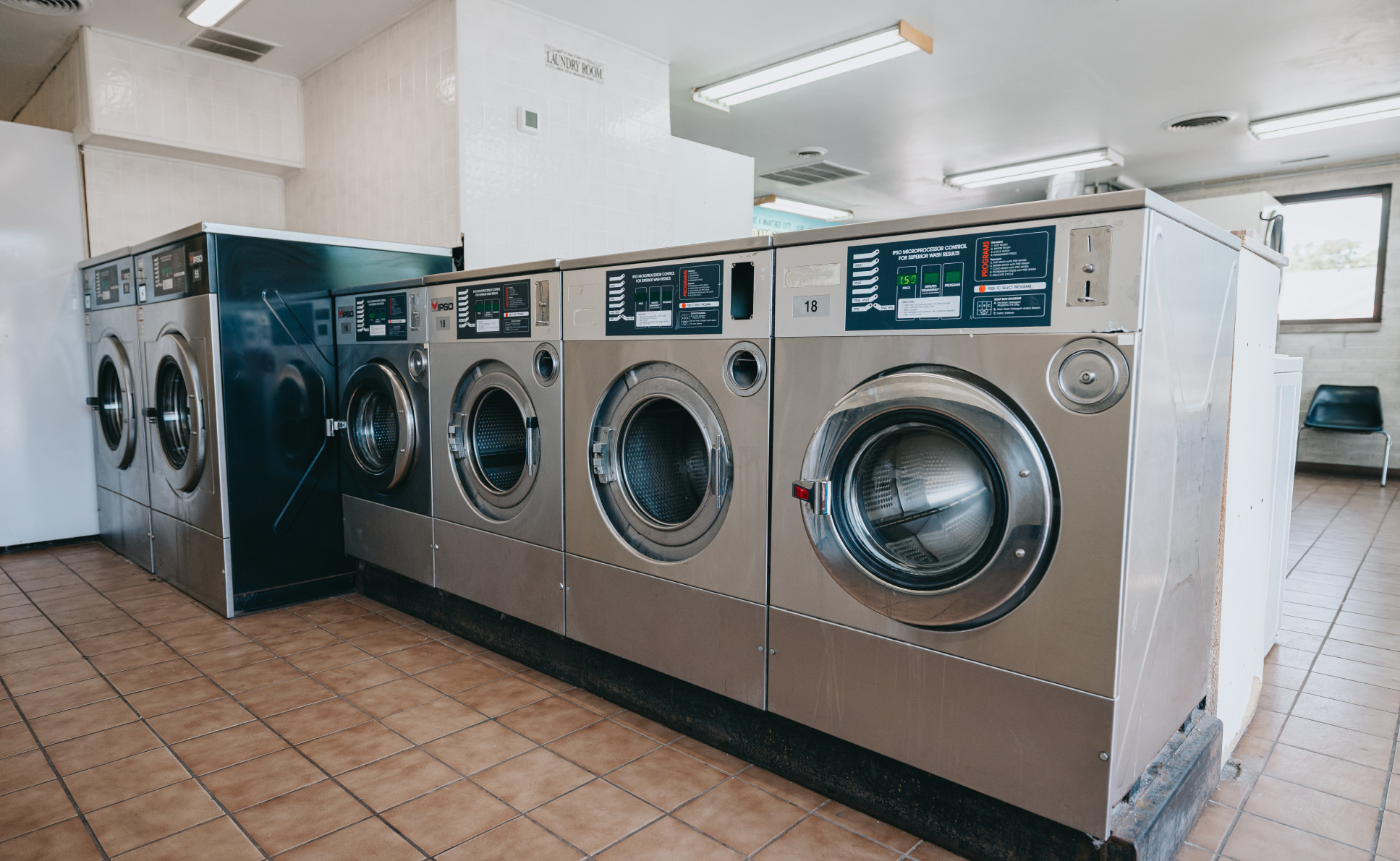 Self-serve laundromat interior at Legendary in Cortland IL