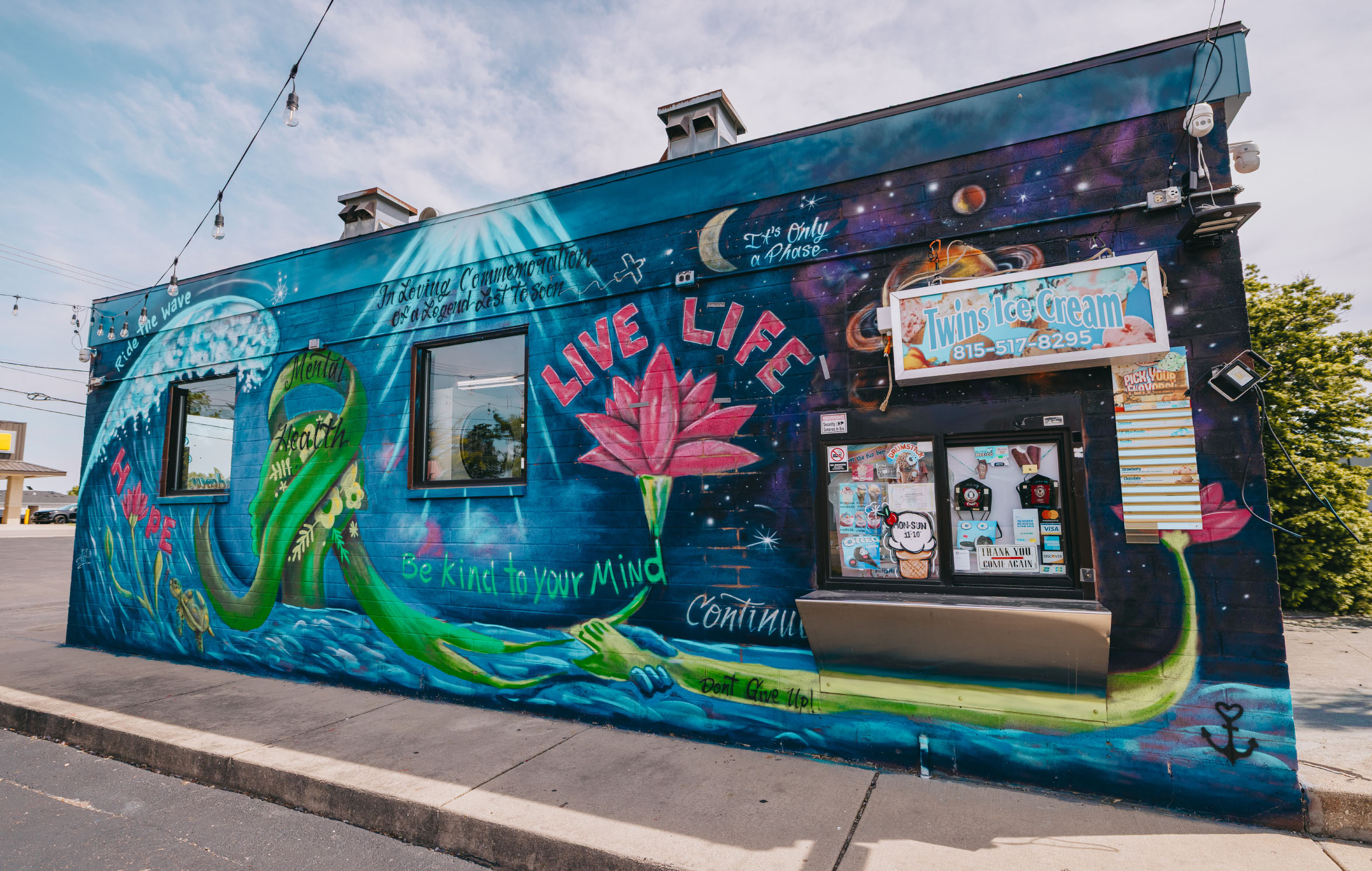 Legendary Laundromat and Car Wash exterior with bubble mural in Cortland IL