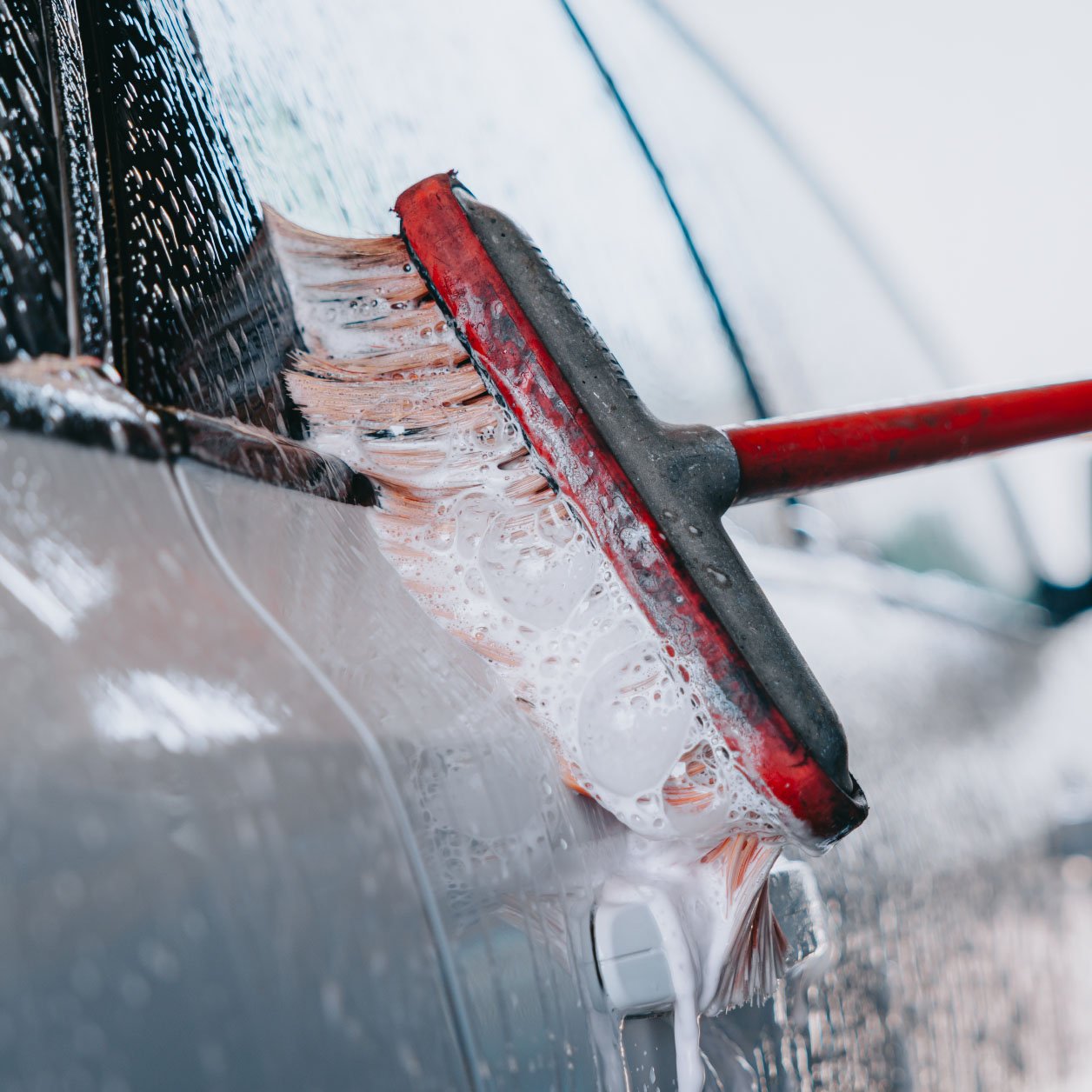 Foam brush self-serve car wash bay at Legendary in Cortland IL