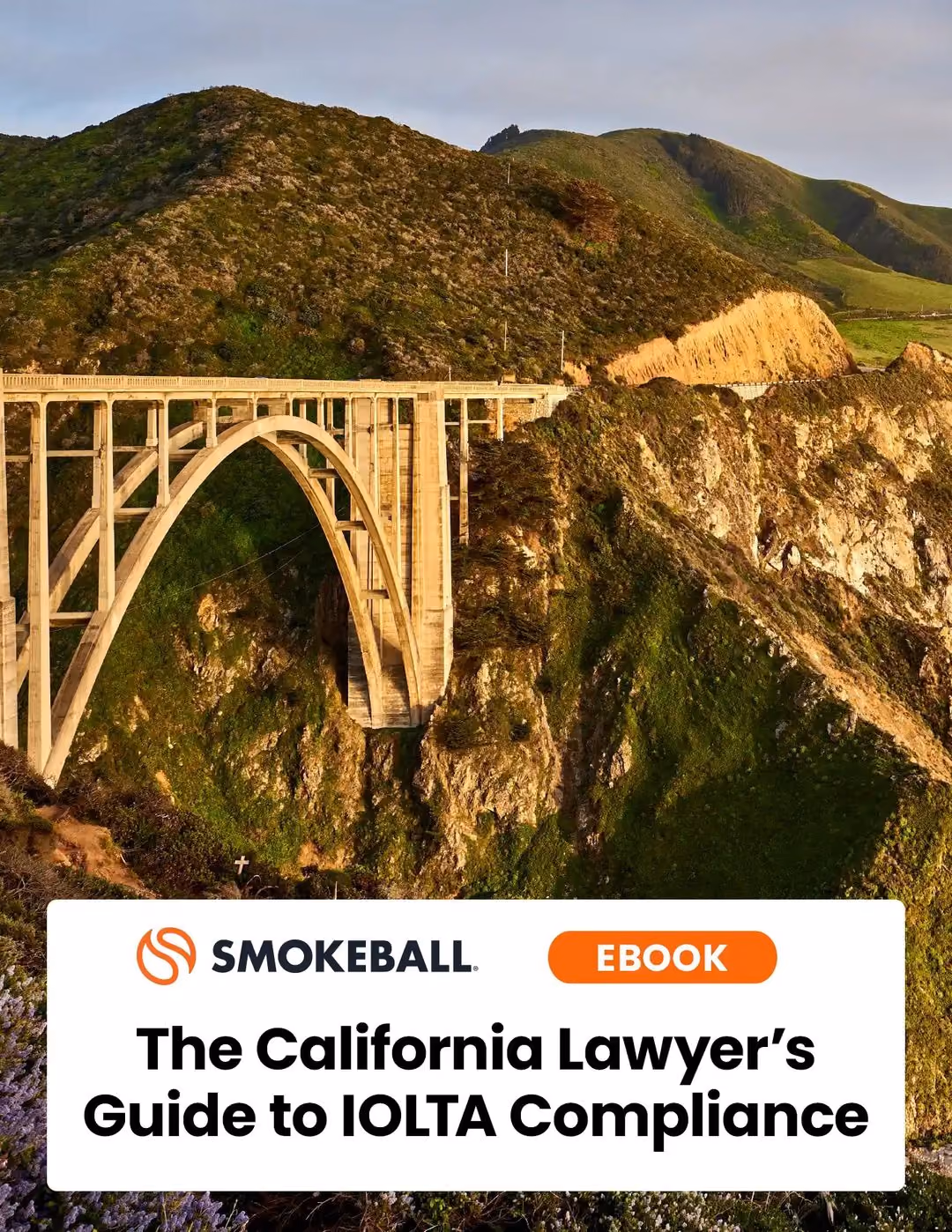 Sunlit concrete arch bridge over a green rocky canyon with a Smokeball ebook title about IOLTA compliance.