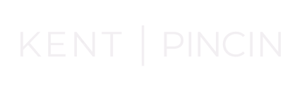 Text reading 'KENT | PINCIN' in light font on a transparent background.