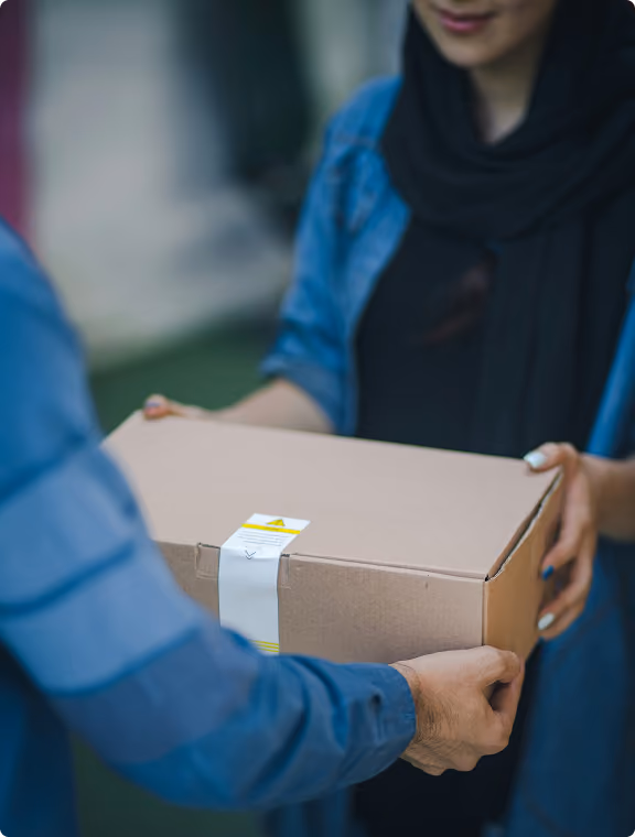 Parcel being handed over between two people