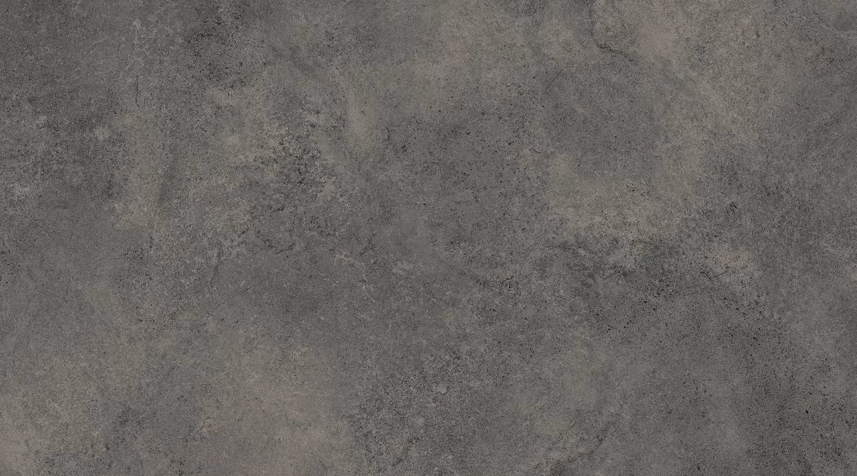 Dark sandstone-look worktop by ME Kitchen with a natural stone texture and deep grey tone, perfect for a modern, industrial kitchen.