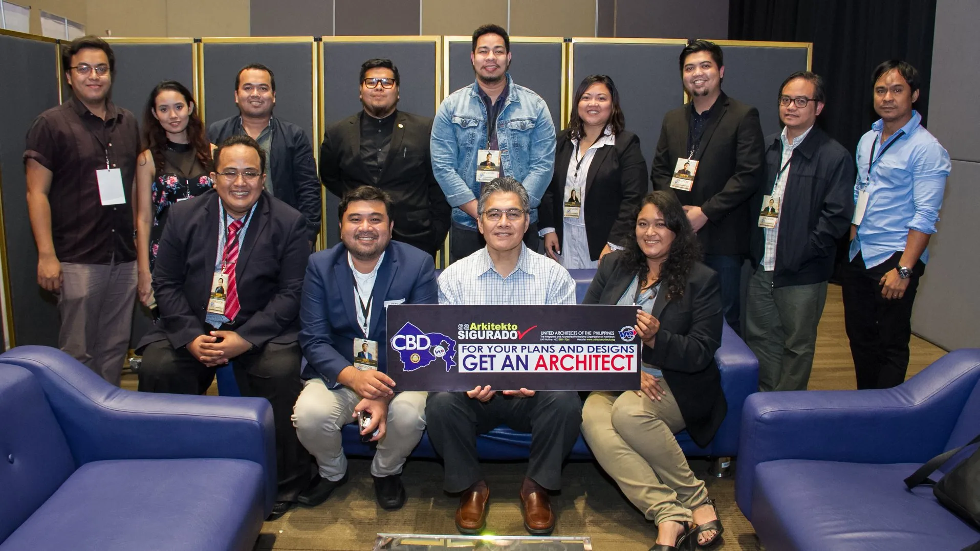 Arch. Armando Allí with United Architects of the Philippines members holding a Get An Architect advocacy sign
