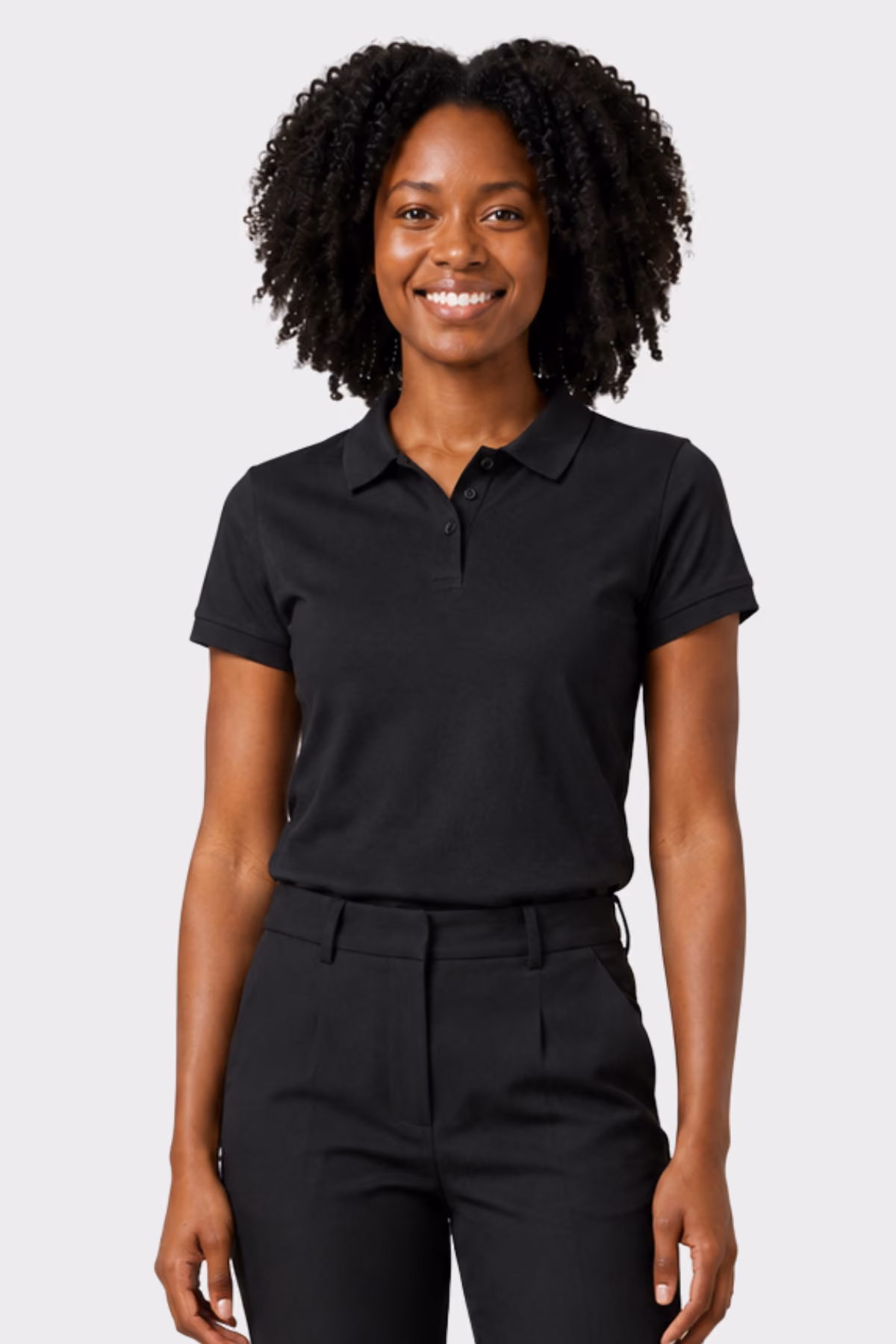 Woman wearing a black short-sleeve hospitality polo with black trousers