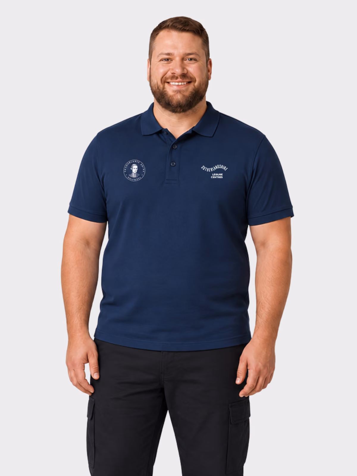 Man wearing a navy branded government polo shirt with black cargo trousers