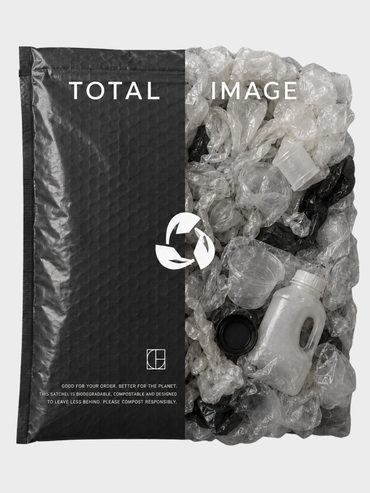 Black Total Image compostable mailer satchel beside a pile of plastic waste