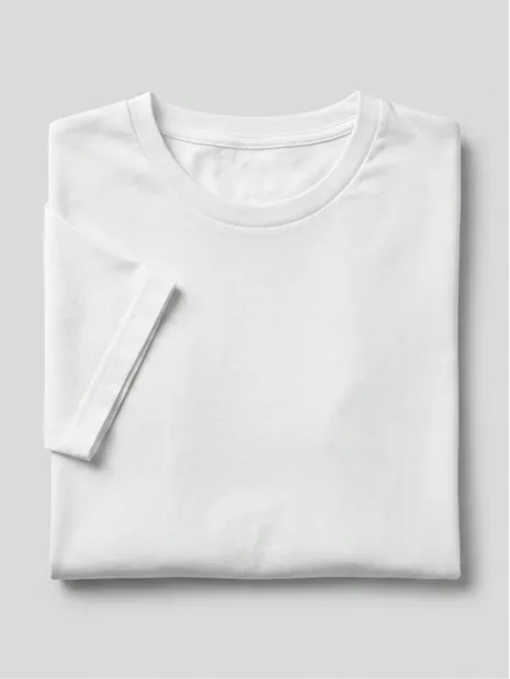 Plain white short-sleeve T-shirt neatly folded on a light gray surface.