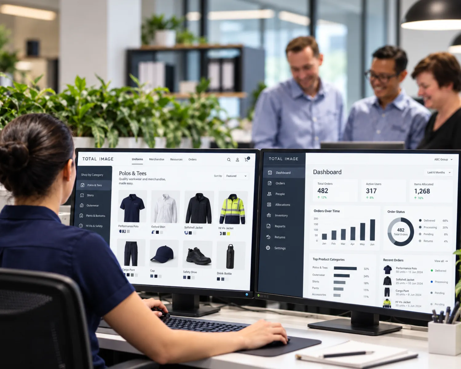 Staff member using the Total Image uniform ordering portal and dashboard on two monitors
