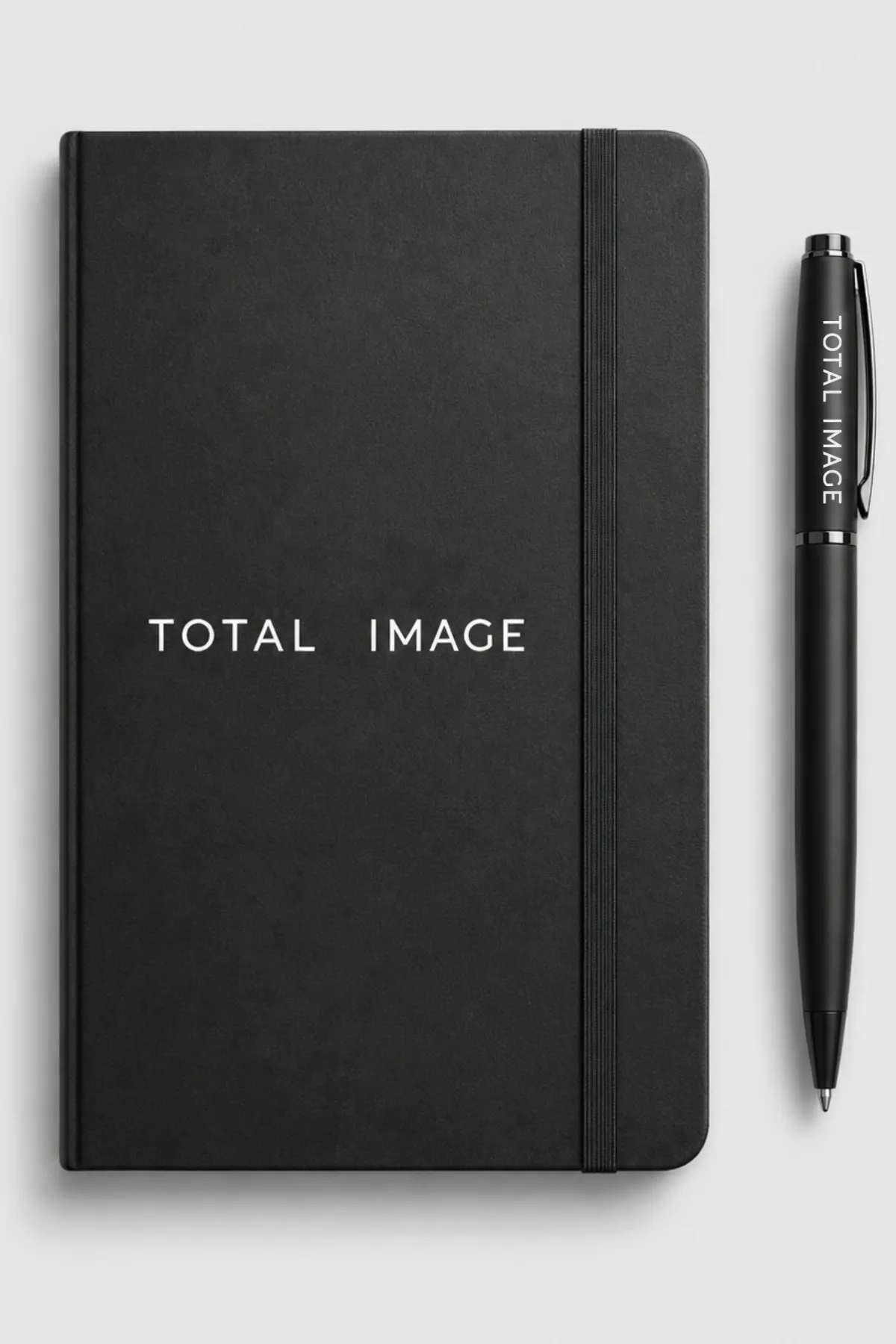 Black Total Image branded notebook and pen