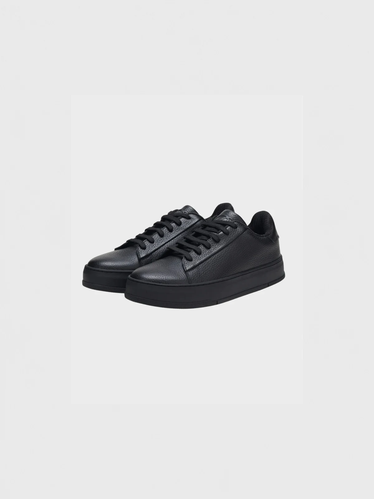 Pair of black leather lace-up sneakers