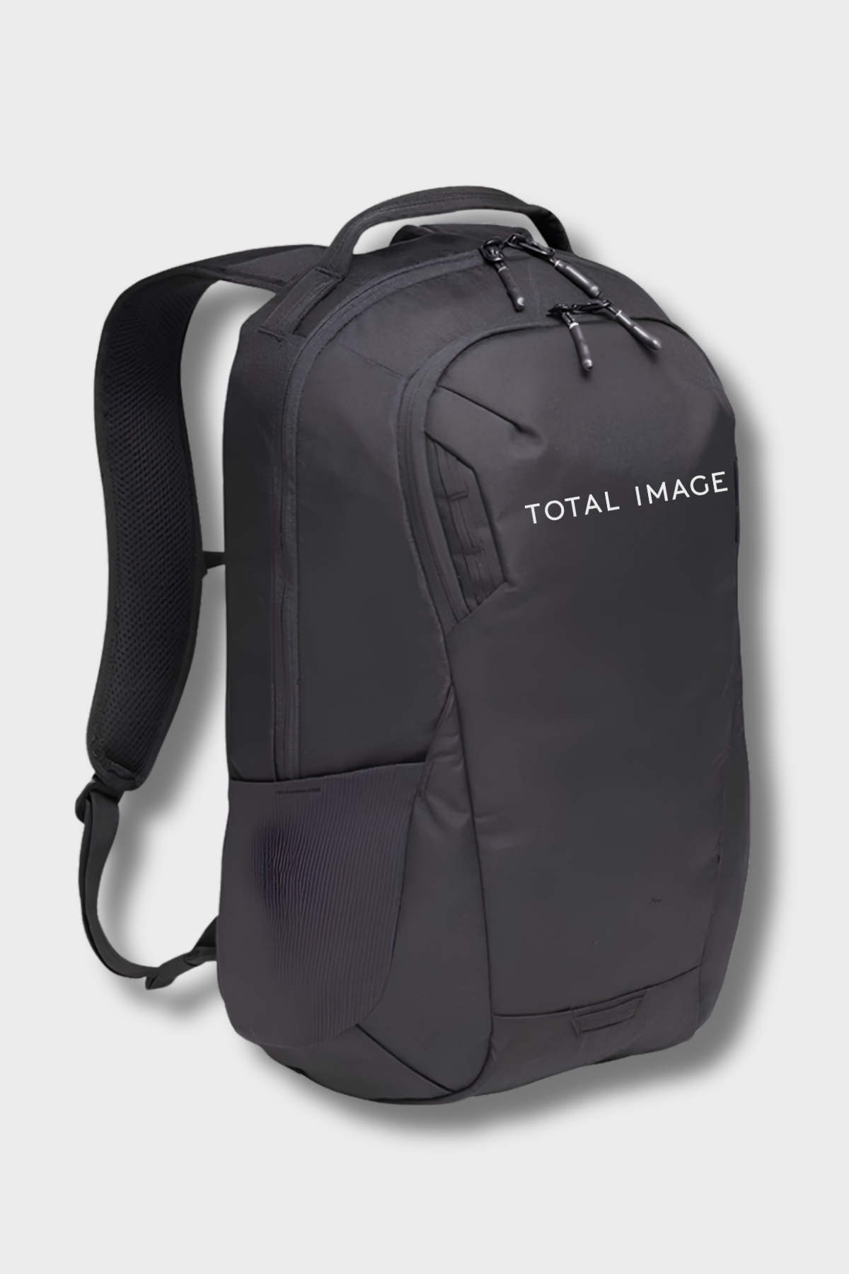 Black backpack printed with the Total Image logo