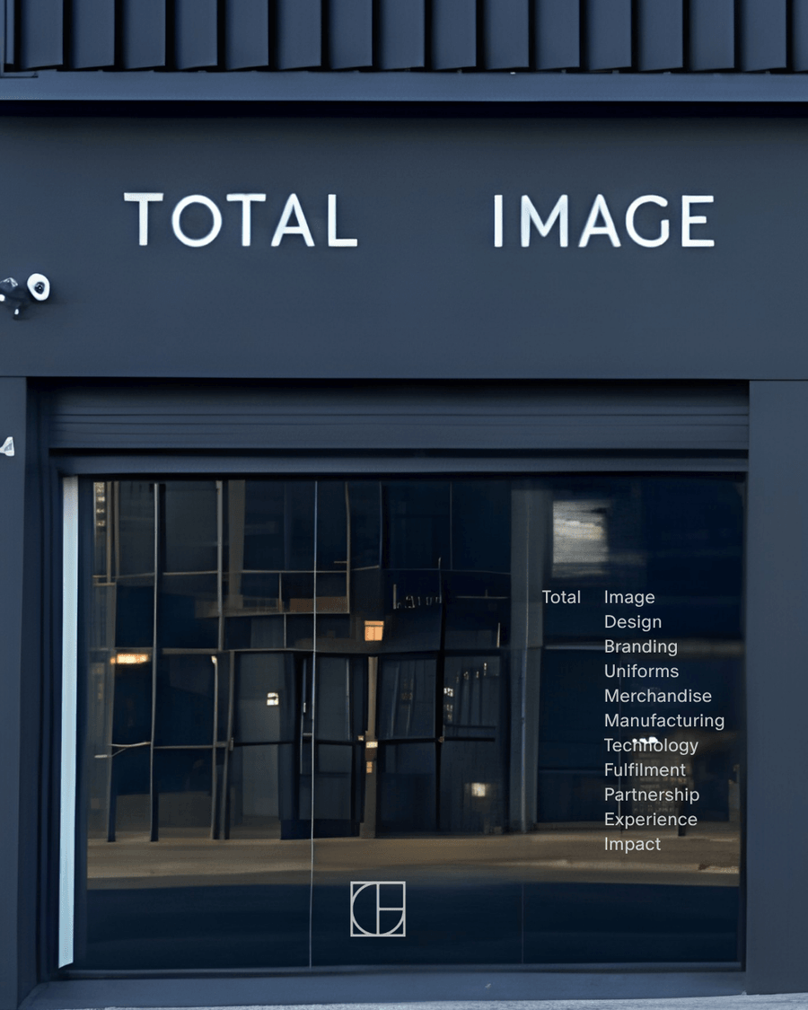 Exterior of the Total Image showroom with illuminated signage