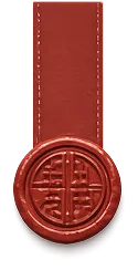 Red wax seal with a vertical strip and embossed Chinese symbol in the center.