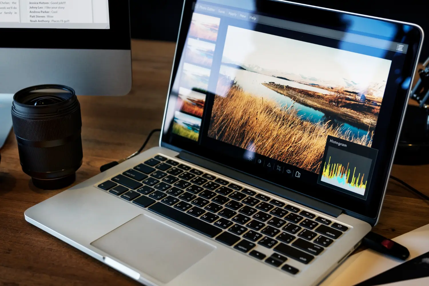 Illustration of a desk with a notebook, pen, coffee cup, and laptop