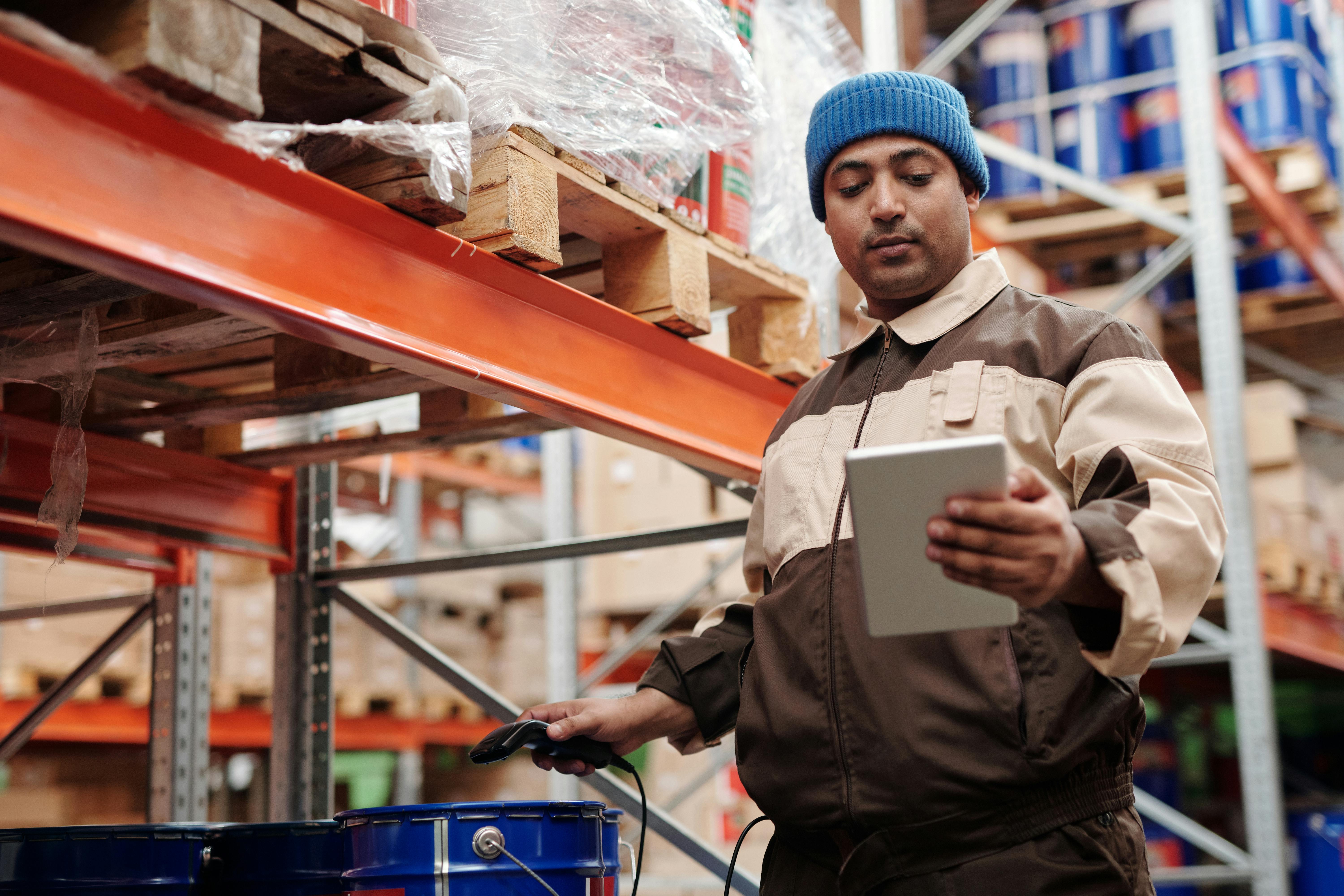 Scanning product barcodes to ensure accurate warehouse inventory tracking.