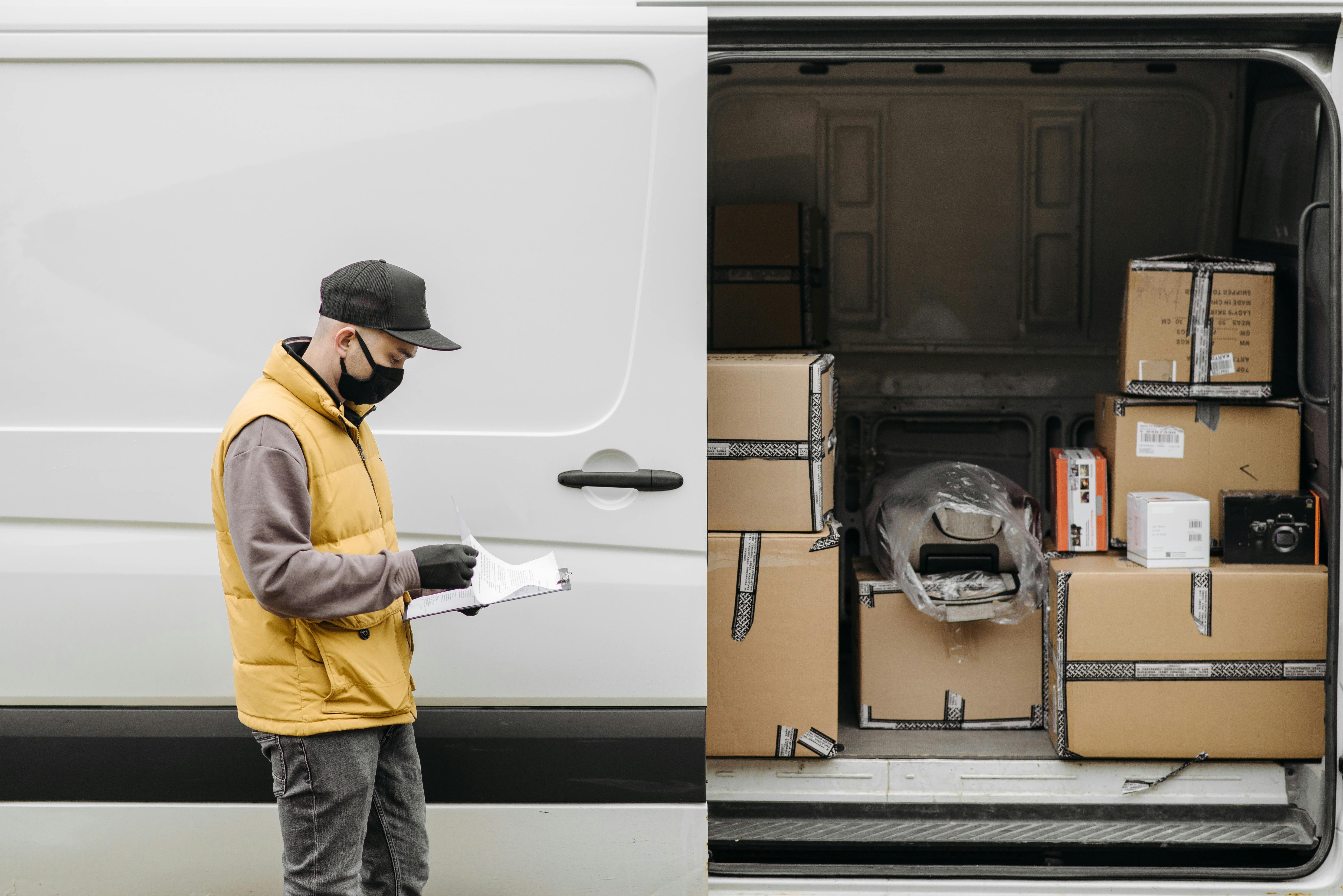Warehouse worker shipping customer orders as part of demand planning and fulfillment process