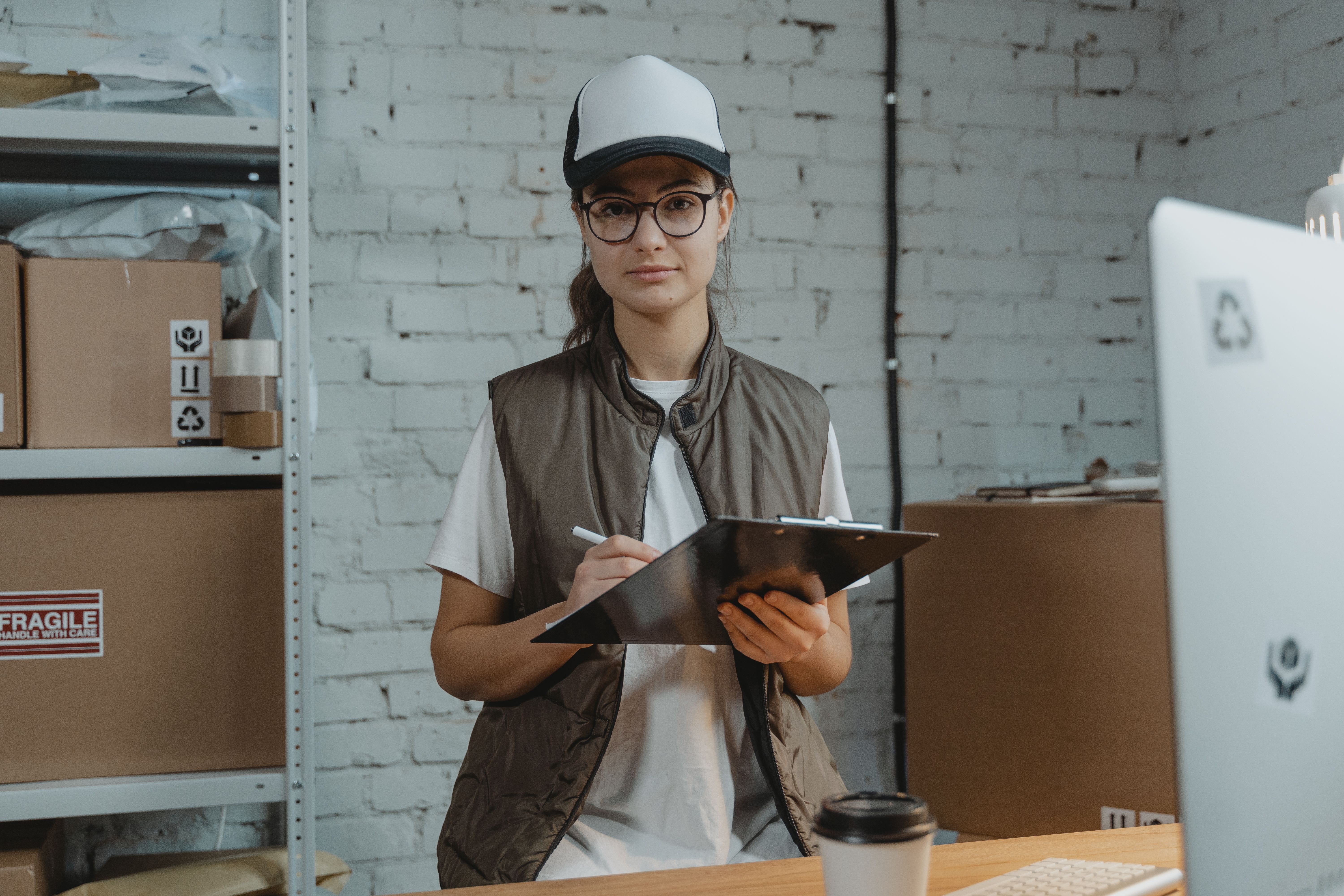Manufacturing team member operating production machinery
