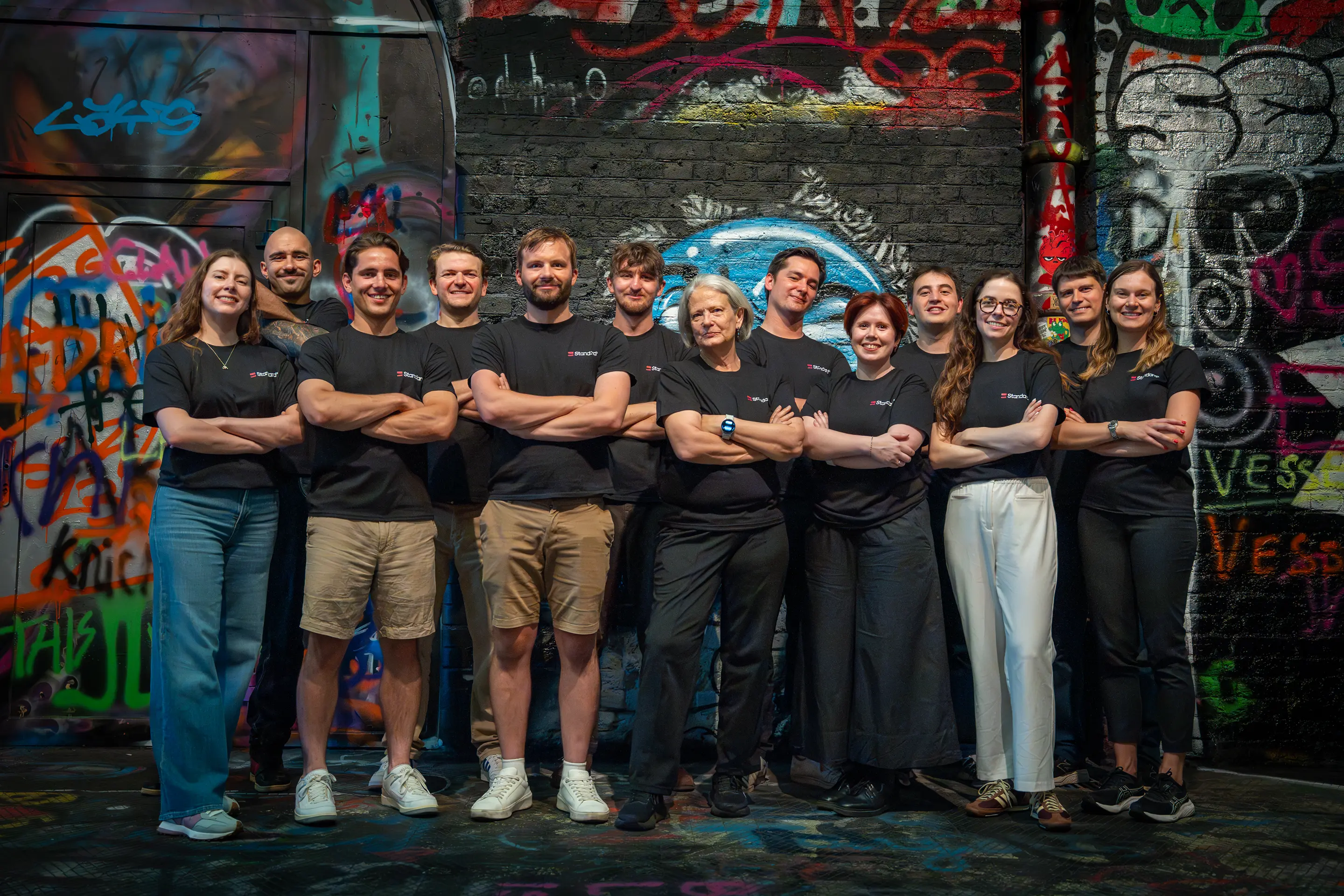 The full standard X team standing in the graffiti filled Leak street arches of waterloo